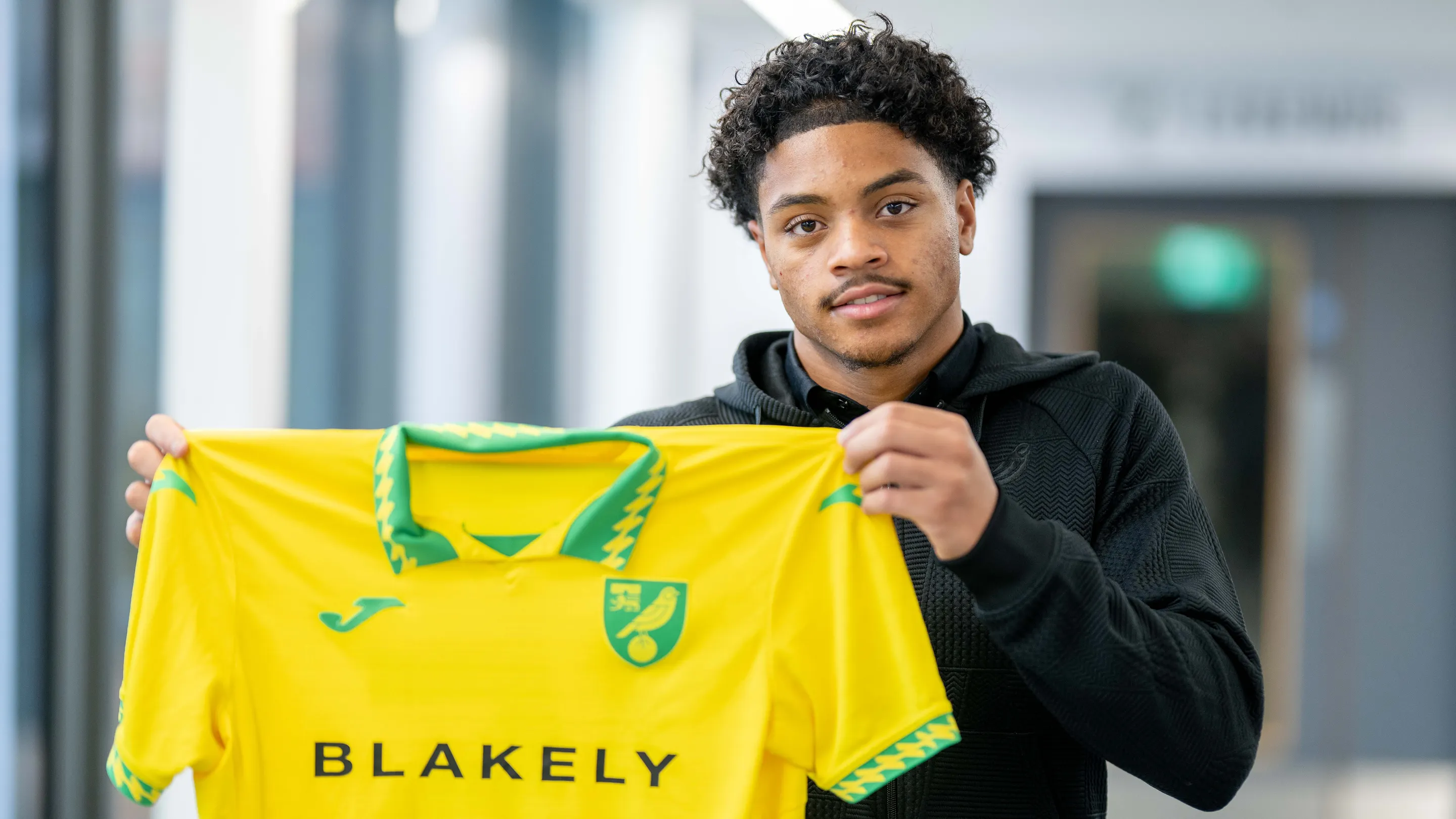 Ben Tree signs his first professional contract with the Canaries
